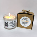 a candle that is next to a box