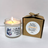 a candle that is next to a box