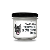 a candle with a picture of a dog on it