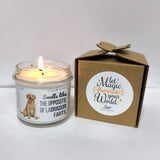 a candle that is next to a box