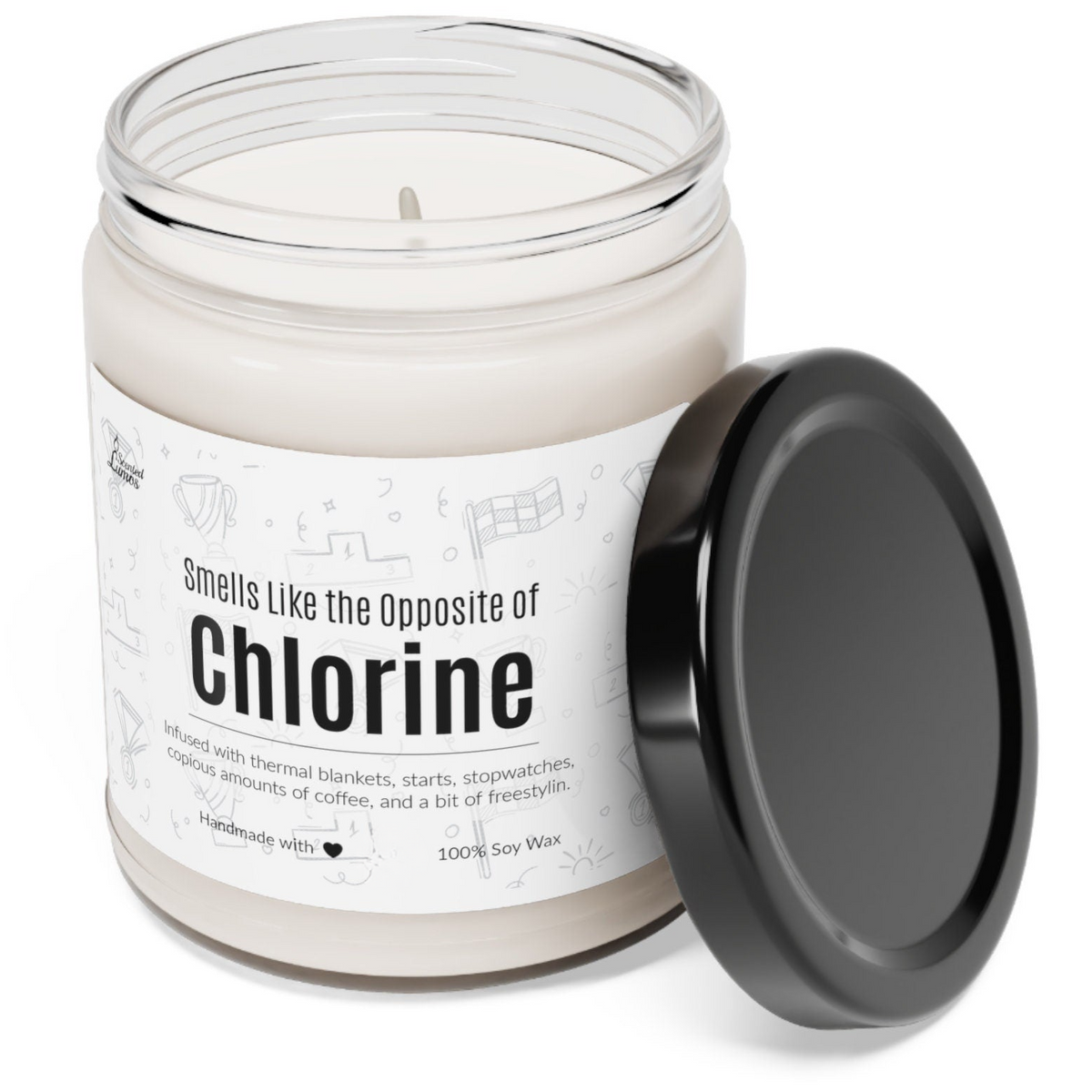 a candle with a black lid sitting next to it