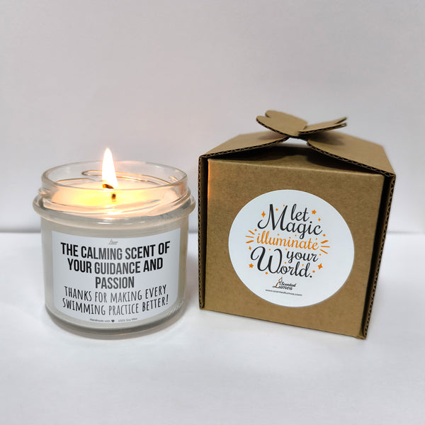 a candle that is next to a box