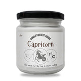 a jar of capricorn candles on a white background