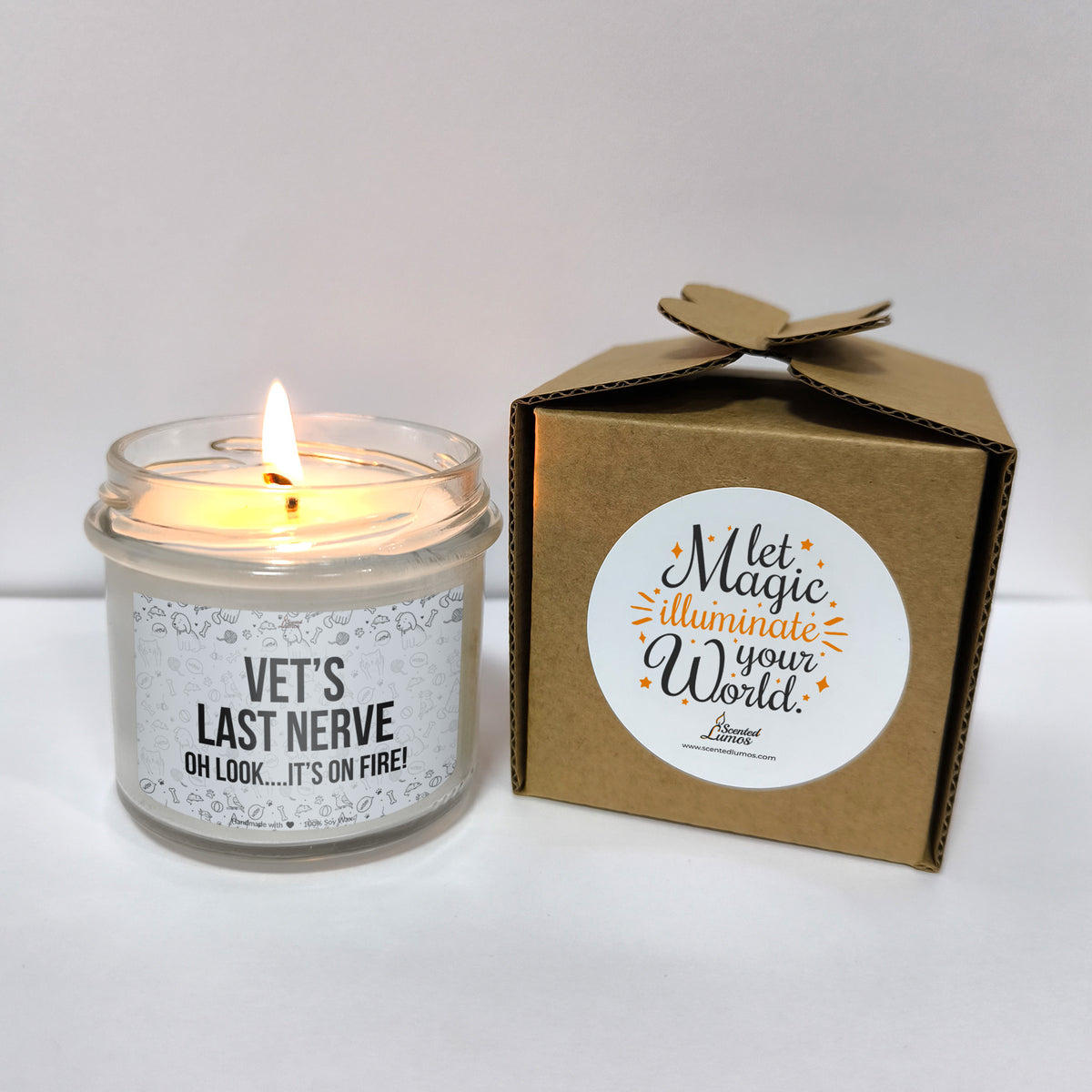 a candle that is next to a box