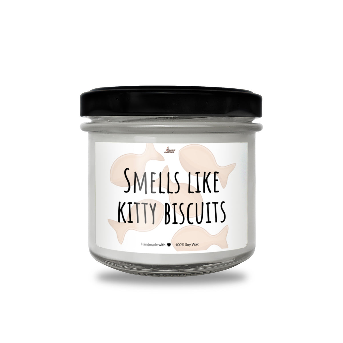 a glass jar with a black lid that says smells like kitty biscuits