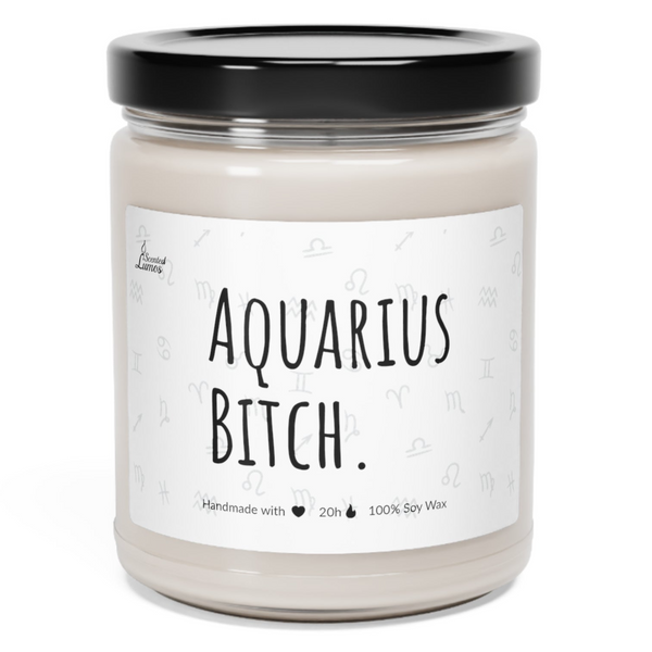 a jar of aquarius bitch candle sitting on a white surface