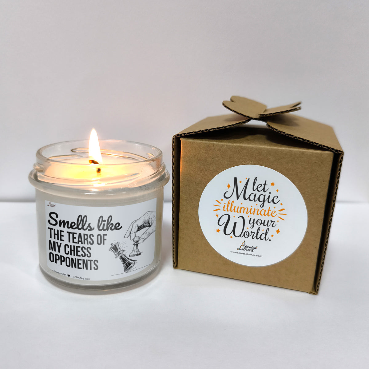 a candle that is sitting next to a box