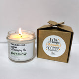 a candle that is next to a box