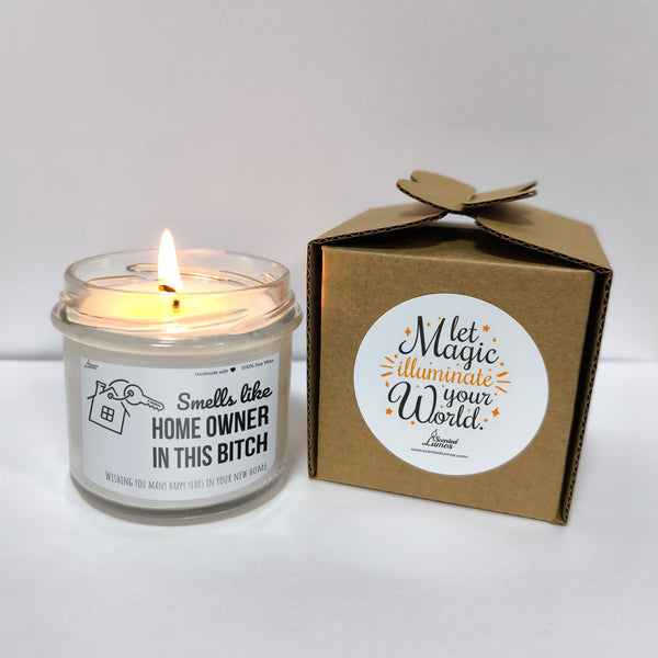 a candle sitting next to a box of matches