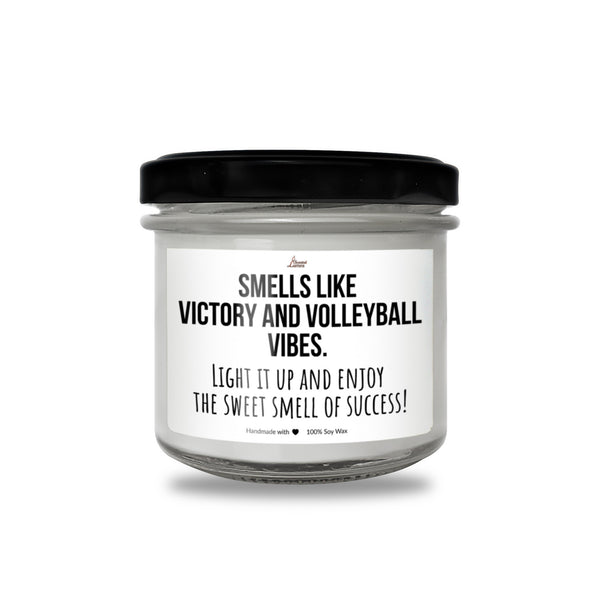 a jar of white candles with a black lid