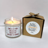 a candle that is next to a box