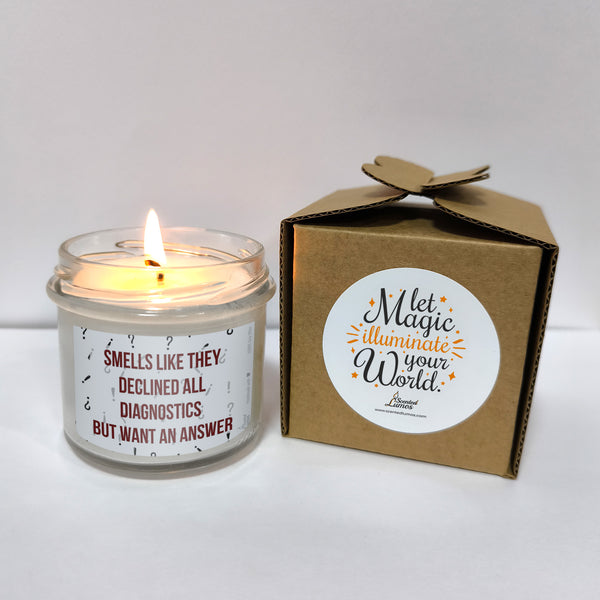 a candle that is next to a box