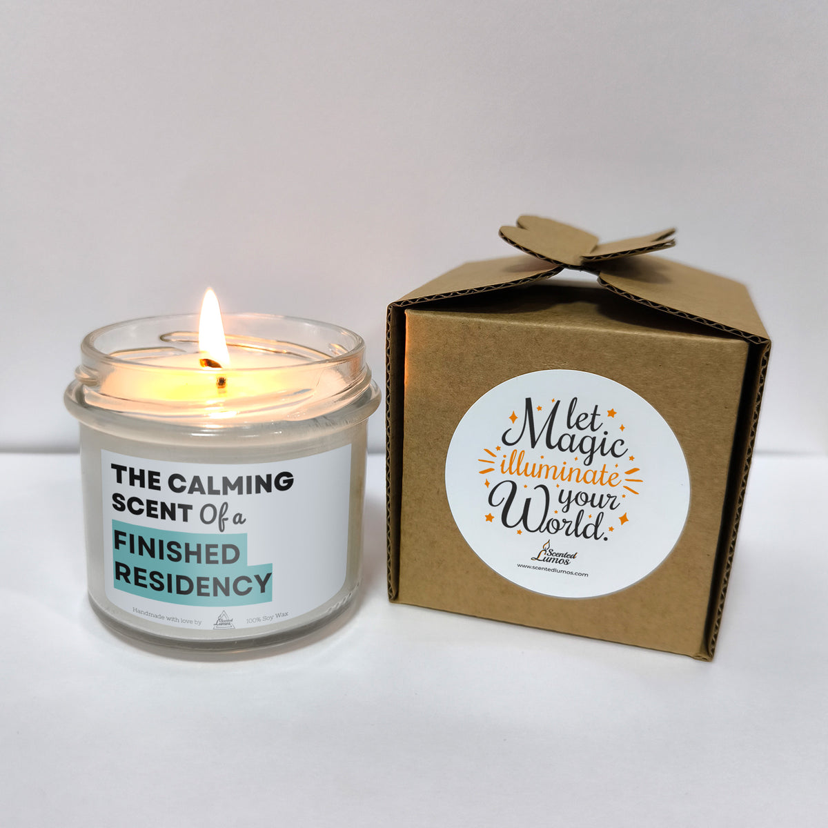 a candle that is next to a box