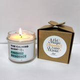 a candle that is next to a box