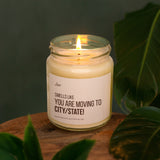 a candle sitting on top of a wooden table