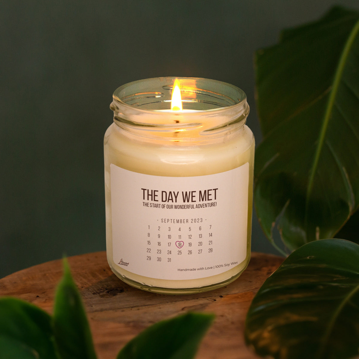 a candle sitting on top of a wooden table