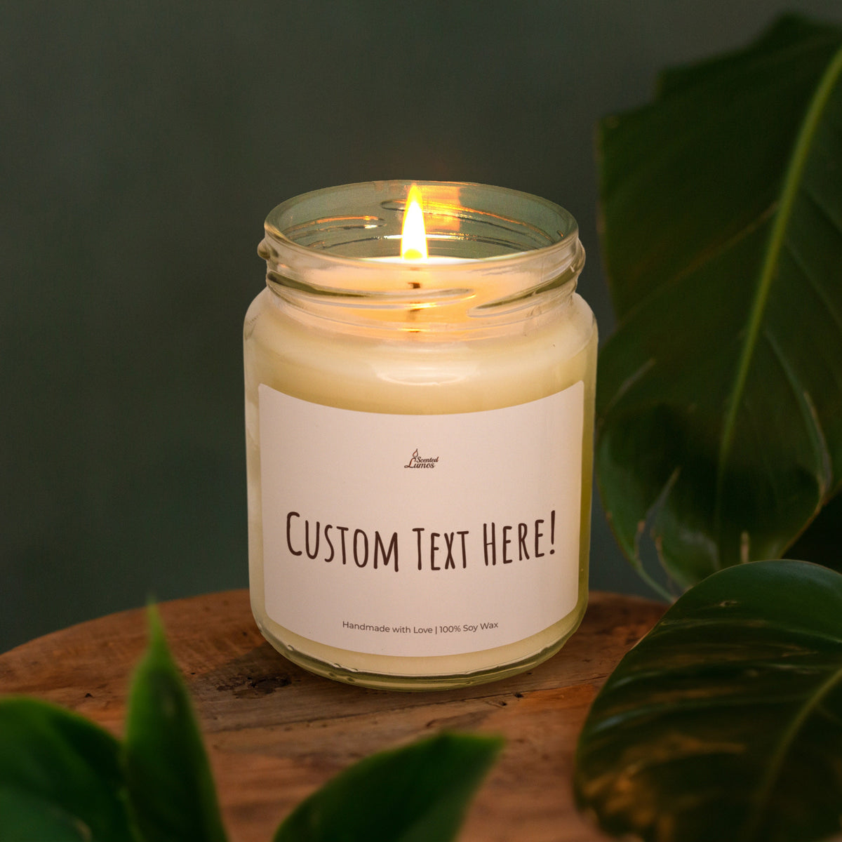 a candle sitting on top of a wooden table