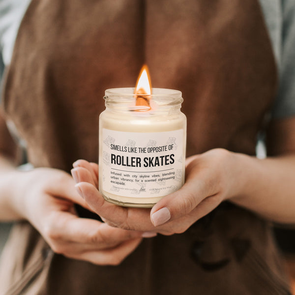 a person holding a candle in their hands