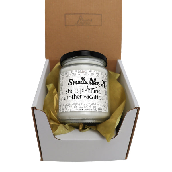 a small jar of candle sitting inside of a box