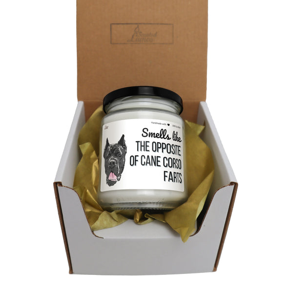 a candle in a box with a label on it