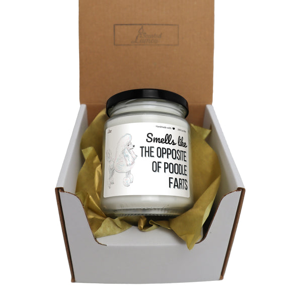 a small jar of food in a box