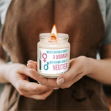 a woman holding a jar with a candle in it