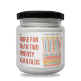 a jar of birthday candles with the words more fun than two twenty year olds