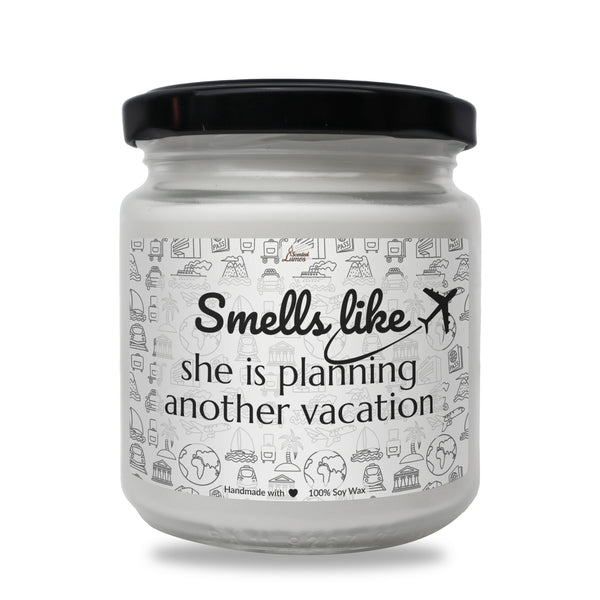 a white jar with a black lid that says smell like x she is planning another