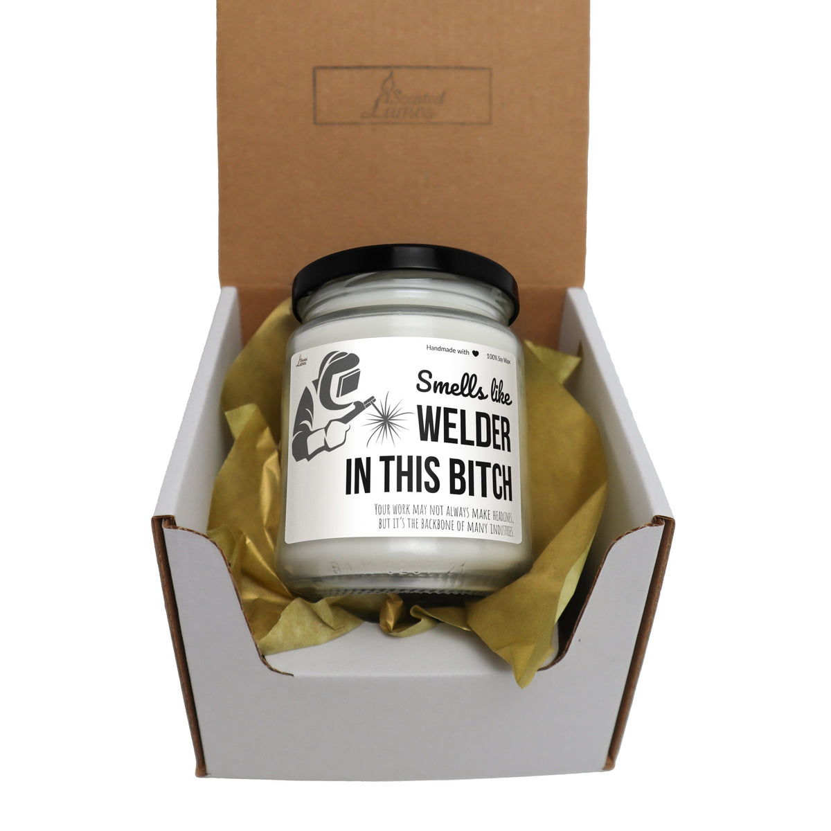 a candle in a gift box with a yellow ribbon around it