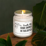 a candle sitting on top of a wooden table