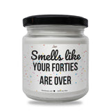 a white jar with a black lid that says smell like your forties are over