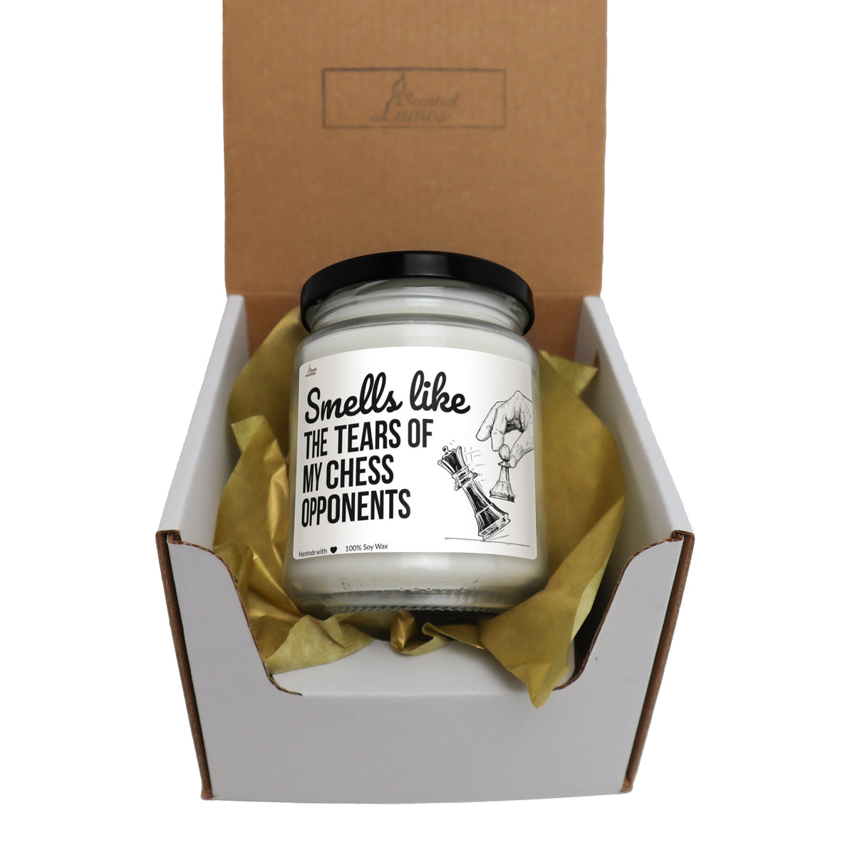 a small jar of tea sits in a box