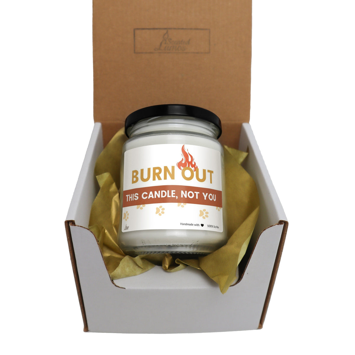 a candle in a box that is open