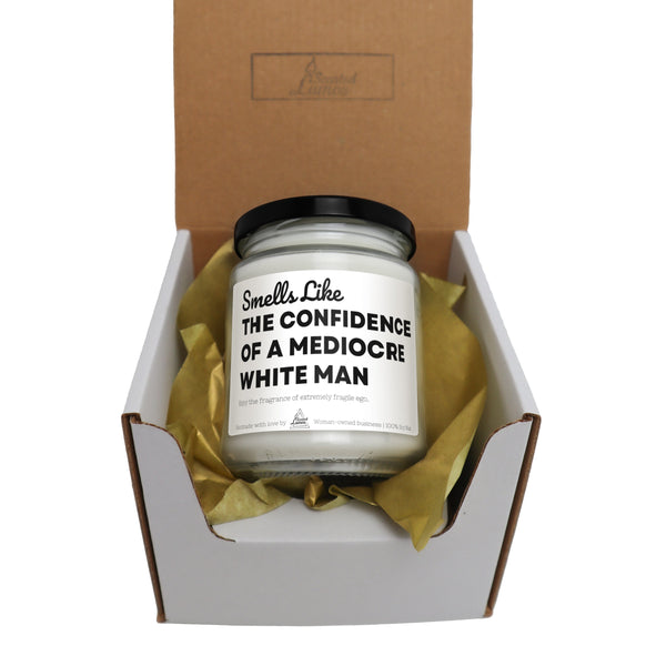 a box with a candle inside of it