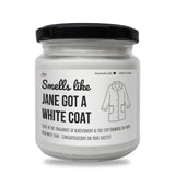 a jar of white coat sitting on top of a table