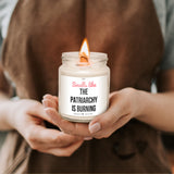 a person holding a candle in their hands