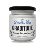 a jar of white paint with a black lid