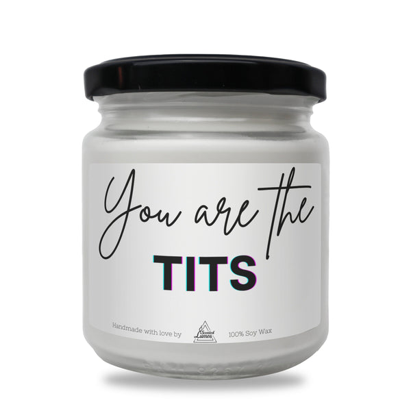 a white jar with a black lid that says you are the tits