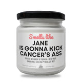 a jar of white candles with a black lid