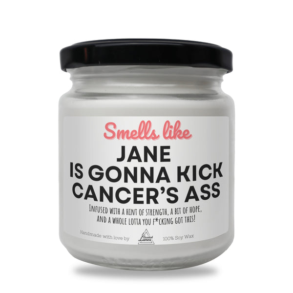 a jar of white candles with a black lid