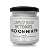 a white jar with a black lid that says only bad bitches go on hike
