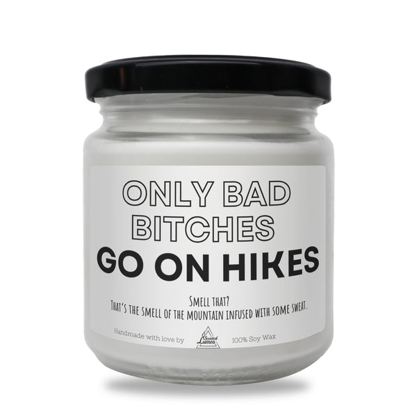 a white jar with a black lid that says only bad bitches go on hike