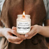 a woman holding a jar of vet techs