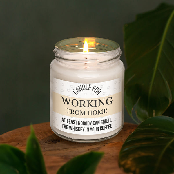 a candle sitting on top of a wooden table