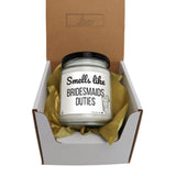 a small jar of bridesmaids duties sits in a box