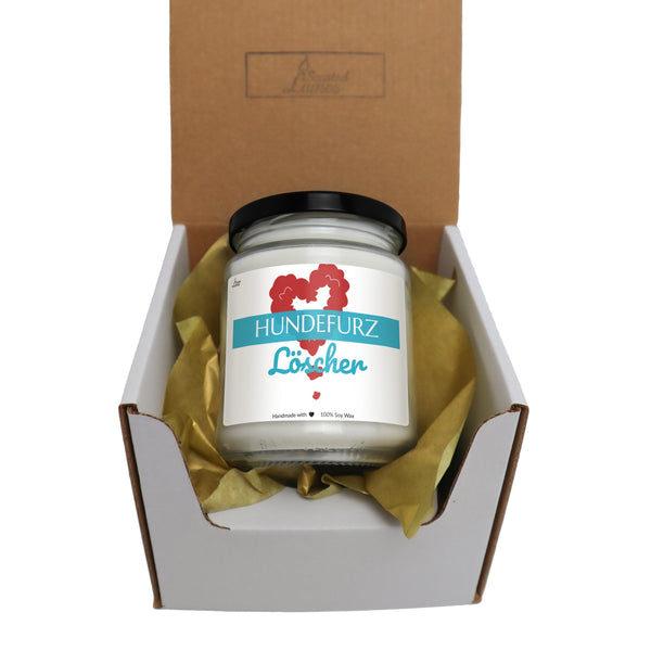 a box with a candle inside of it