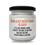a white jar with a black lid that says being a vet receptionistist is easy