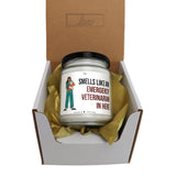 a candle in a box that says smells like an emergency vietnam in here