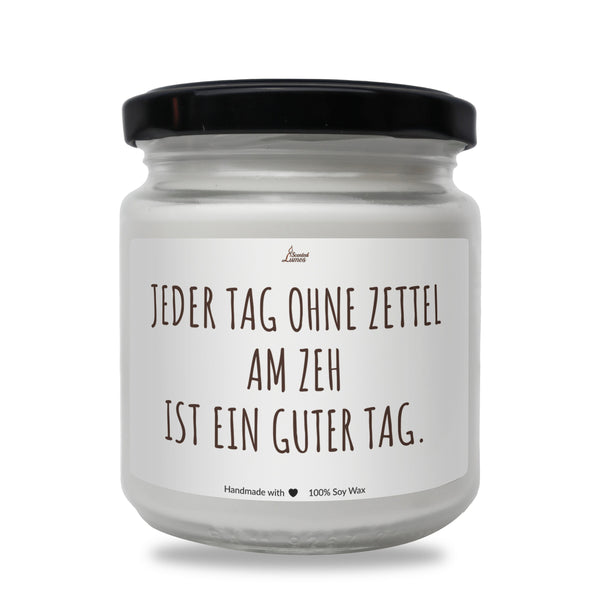 a white jar with a black lid and a black lid