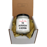 a small jar of patriacry is burning in a box